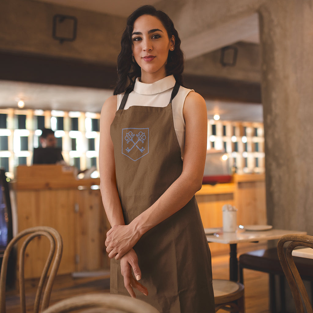 The Inheritance Crest in Brown Apron
