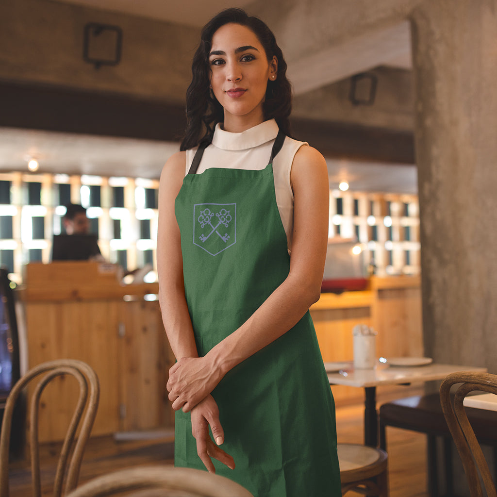 The Inheritance Crest in Green Apron