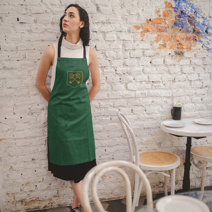 The Inheritance Crest in Green Apron