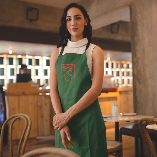 The Inheritance Crest in Green Apron