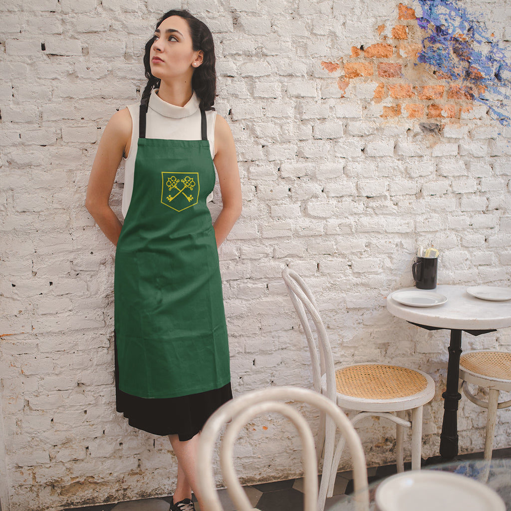 The Inheritance Crest in Green Apron