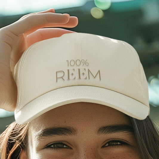 100% REEM Embroidered Cap